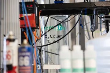 Hydrophis-labelled CO₂ column equipment and sample bottles in the foreground.